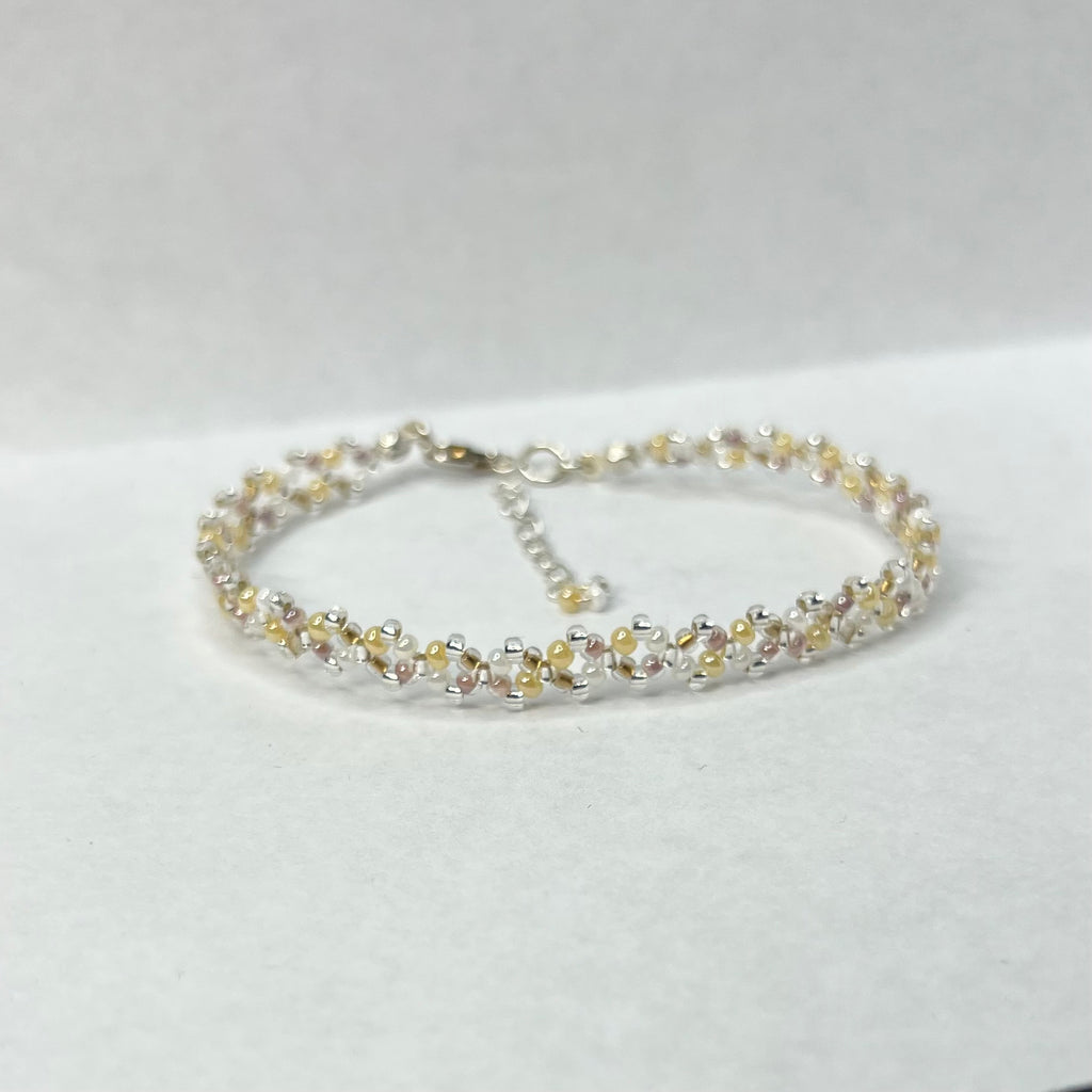 Beaded bracelet on a light gray background